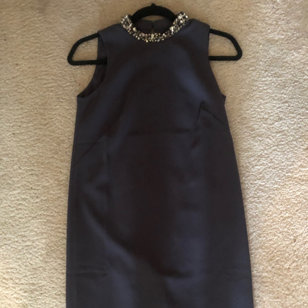 Blue sleeveless jeweled neckline dress